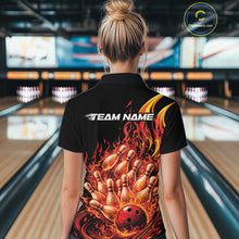 Load image into Gallery viewer, Back view female model wearing polo shirt with flaming bowling ball striking pins turquoise blue explosive fire graphics