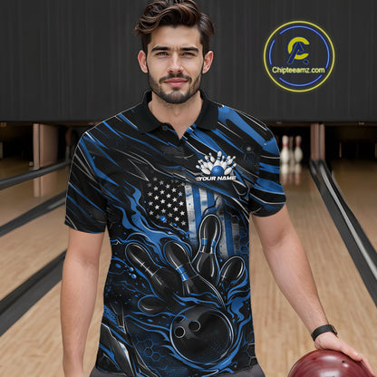 Male model wearing a black and blue bowling polo shirt at a bowling lane with fiery bowling action artwork and patriotic accents.