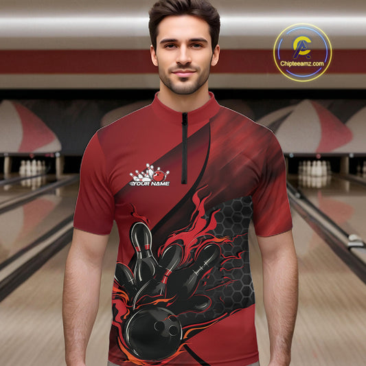 Male model wearing a black and red bowling quarter-zip shirt at a bowling lane with fiery bowling-themed artwork and geometric accents.