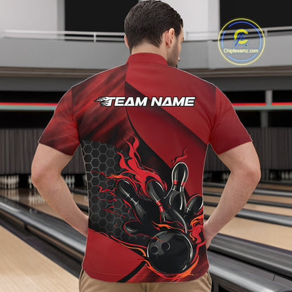 Front view of a male model in a bowling alley wearing a black and red quarter-zip shirt featuring a flaming bowling strike design.