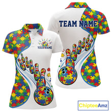 Load image into Gallery viewer, Women’s polo shirt mockup front and back showing colorful autism bowling strike artwork with puzzle elements on white shirt