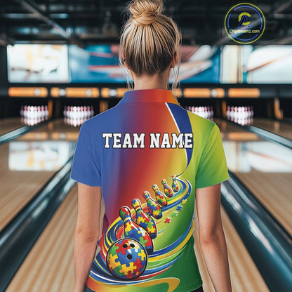 Female model at a bowling alley, back view of colorful polo shirt featuring autism puzzle bowling ball trailing matching bowling pins