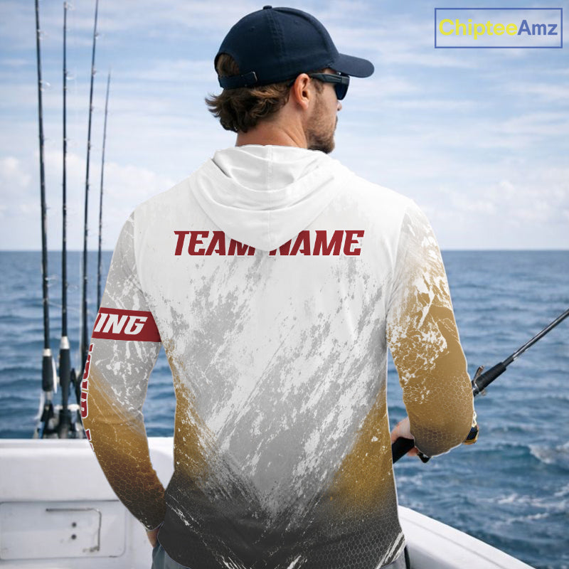 Man wearing a hoodie with a fish design and 'Fish Your Name' text, standing on a boat with ocean background.