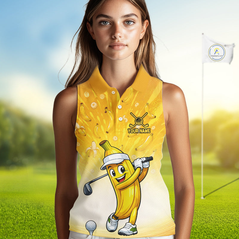 Person wearing a yellow sleeveless golf shirt with a cartoon banana character on a golf course.