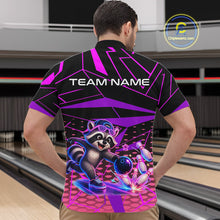 Load image into Gallery viewer, Person wearing a bowling shirt with a raccoon graphic and 'TEAM NAME' text in a bowling alley.