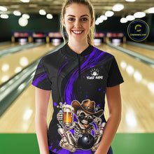 Load image into Gallery viewer, Person wearing a black and purple bowling shirt with a skeleton design in a bowling alley.