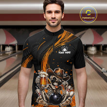Load image into Gallery viewer, Man wearing a black and yellow bowling shirt with a skeleton design in a bowling alley.