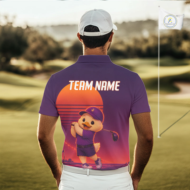 Person wearing a purple polo shirt with a cartoon duck design and 'Team Name' text on a golf course.