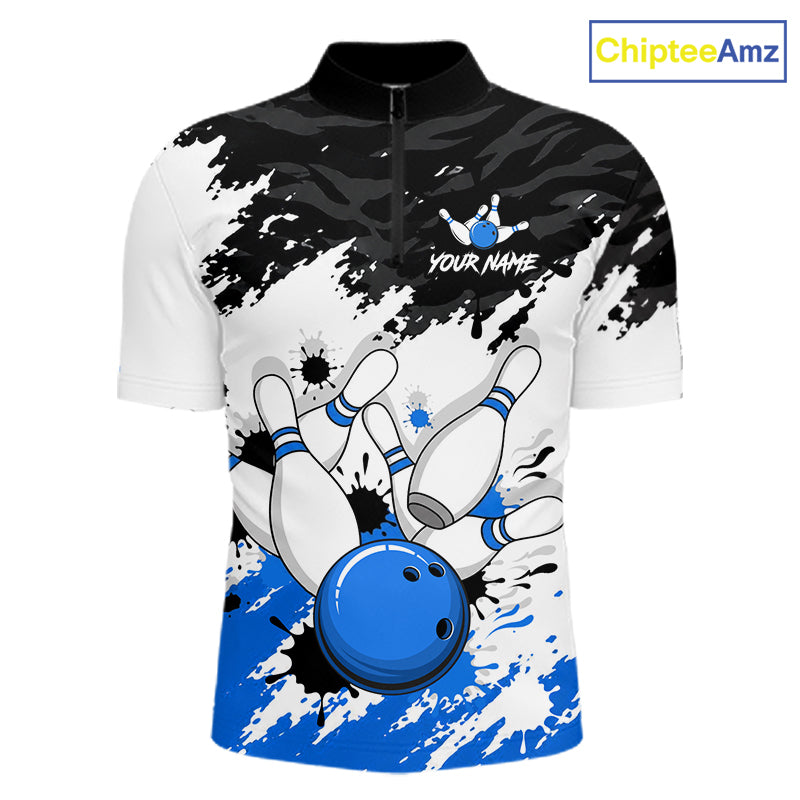 A short-sleeve quarter-zip bowling-themed polo shirt with a black, white, and blue paint-splatter graphic featuring bowling pins and a blue bowling ball. The shirt has a black collar and a mock logo on the chest reading 'YOUR NAME' with bowling pins.
