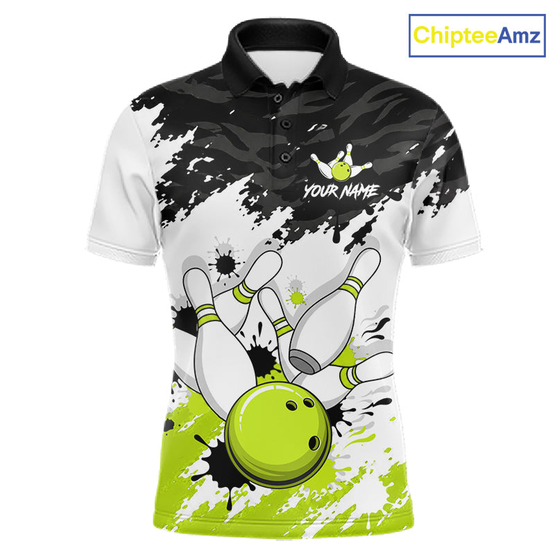 A short-sleeve polo shirt with a bowling-themed graphic print, featuring bowling pins, a bowling ball, and black-and-white paint splatter patterns. The shirt has a black collar, a black-and-white upper body, and bright lime green accents at the bottom and on the bowling pins.