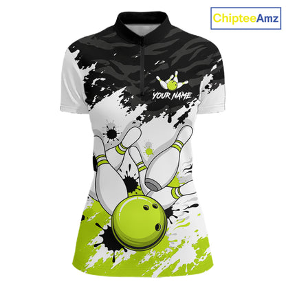 A women's short-sleeve polo shirt with a bowling-themed graphic print. The design features a black and white splatter pattern on the upper chest and shoulders, white bowling pins, and a bright lime green bowling ball on the lower front.