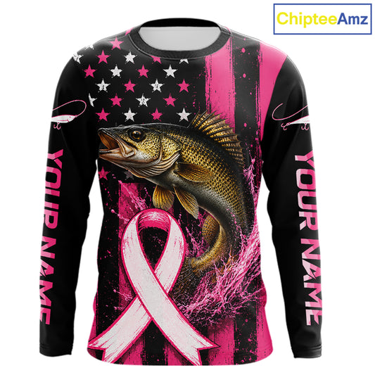 A long-sleeve custom graphic shirt featuring a large bass fish, a pink awareness ribbon, and a black-and-pink American flag design. The sleeves have placeholder text reading 'YOUR NAME' and a 'ChipteeAmz' logo appears in the top right corner.