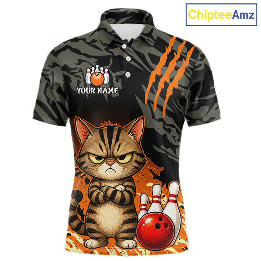 A short-sleeve polo shirt with a dark gray and black camouflage pattern, featuring orange claw marks on the right side. The front has a cartoon illustration of an angry tabby cat standing next to red and white bowling pins, with a customizable name graphic and bowling pin graphic on the left chest.