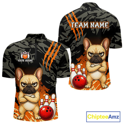 Front and back views of a short-sleeve custom bowling shirt with a cartoon French bulldog, orange claw marks, bowling pins, and bowling balls on a black camouflage background. The front shows a paw print logo with placeholder text 'YOUR NAME' and 'TEAM NAME' on the back.