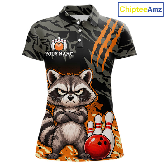A women's short-sleeve polo shirt with a dark camouflage pattern, orange claw-stripe graphics, and a large cartoon raccoon holding bowling pins next to a red bowling ball. The shirt includes a customizable name graphic on the left chest and a visible 'ChipteeAmz' watermark in the top right corner.