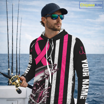 A man on a boat wearing a black, white, and pink striped hoodie with a fish graphic and 'YOUR NAME' printed on the sleeve. He is also wearing a navy cap and sunglasses, holding a fishing rod.