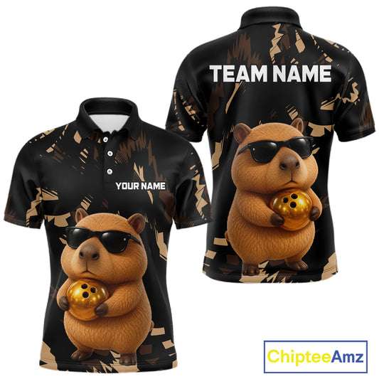 Black polo shirt with a capybara holding a gold ball design, customizable text, and Chiptee Amz branding.