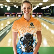 Load image into Gallery viewer, Bowler wearing custom orange and blue leopard bowling shirt on the lanes