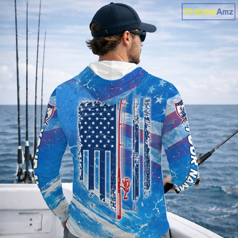 Man on a boat wearing a blue American flag largemouth bass hooded fishing shirt with custom name on the sleeves