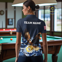 Load image into Gallery viewer, Woman wearing blue camo eagle 8 ball and 9 ball pool billiard team jersey polo shirt featuring blue camouflage eagle artwork, back view.