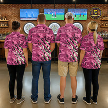 Load image into Gallery viewer, Darts team wearing matching personalized pink military camo darts league team jerseys featuring pink camouflage graphics, front view.