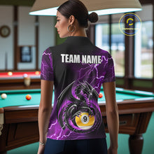 Load image into Gallery viewer, Back view of woman wearing a purple thunder lightning dragon 9 ball pool shirt in a billiards hall.