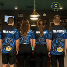 Load image into Gallery viewer, Back view of pool players wearing matching blue thunder lightning dragon billiard shirts in a game room.