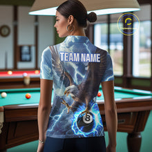 Load image into Gallery viewer, Back view of woman wearing a blue thunder eagle pool team shirt in a billiards hall.
