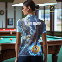 Load image into Gallery viewer, Back view of woman wearing a blue lightning eagle pool team shirt in a billiards hall.