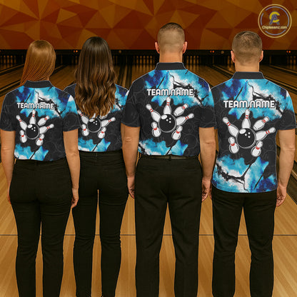 Back view of bowling team wearing matching dreamy blue bowling shirts in a bowling alley.