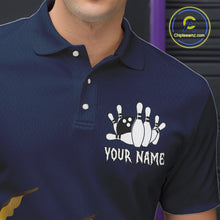 Load image into Gallery viewer, Close up of collar, chest and button details on a navy blue and gold grunge scratch men's bowling polo shirt.