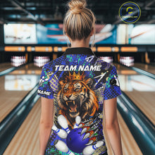 Load image into Gallery viewer, Woman wearing blue graffiti tiger bowling polo shirt back view.