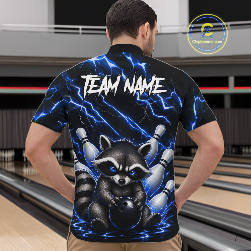 Back view of man wearing a blue neon lightning raccoon bowling quarter zip shirt in a bowling alley.