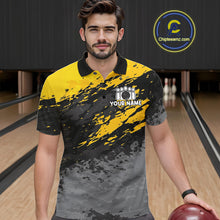 Load image into Gallery viewer, Man wearing a yellow funny banana bowling polo shirt at a bowling alley front view.