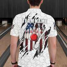 Load image into Gallery viewer, Back view of man wearing a vintage American flag white bowling polo shirt inside a bowling alley.