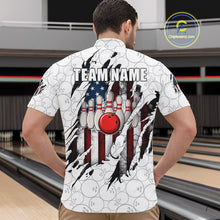 Load image into Gallery viewer, Back view of man wearing a vintage American flag white bowling quarter zip shirt in a bowling alley.