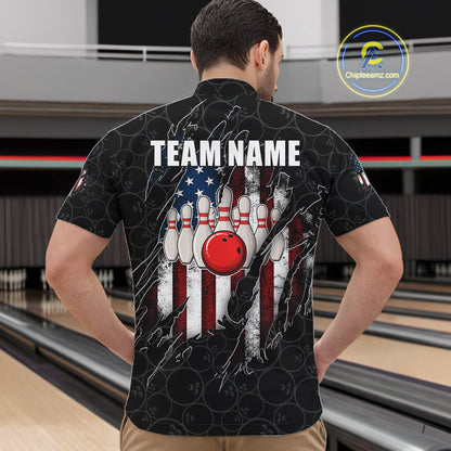 Back view of man wearing a vintage American flag black bowling quarter zip shirt in a bowling alley.