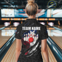 Load image into Gallery viewer, Back view of woman wearing a smoke Texas flag black bowling polo shirt inside a bowling alley.