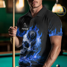 Load image into Gallery viewer, Man wearing a blue flaming skull 8 ball and 9 ball billiard jersey beside a pool table front view.