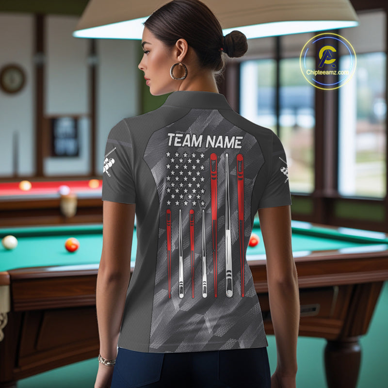 Back view of woman wearing a metal grey American flag 8 ball pool shirt in a billiards hall.