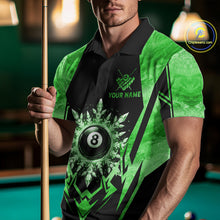 Load image into Gallery viewer, Man wearing black and green 8 ball pool icy billiard team jersey polo shirt featuring the frozen 8 ball artwork, front view.
