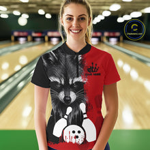 Load image into Gallery viewer, Woman wearing a black and red raccoon bowling quarter zip jersey during league competition front view.
