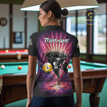 Load image into Gallery viewer, Back view of woman wearing a pink graffiti tornado 8 ball and 9 ball pool shirt in a billiards hall.
