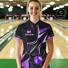 Load image into Gallery viewer, Woman wearing a black and purple quarter zip bowling shirt front view, personalized bowling team apparel.