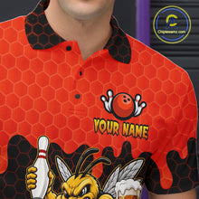 Load image into Gallery viewer, Close-up of the men's Black and Red Funny Bee Beer Bowling polo shirt showing the collar, button placket, chest bee artwork and premium performance fabric