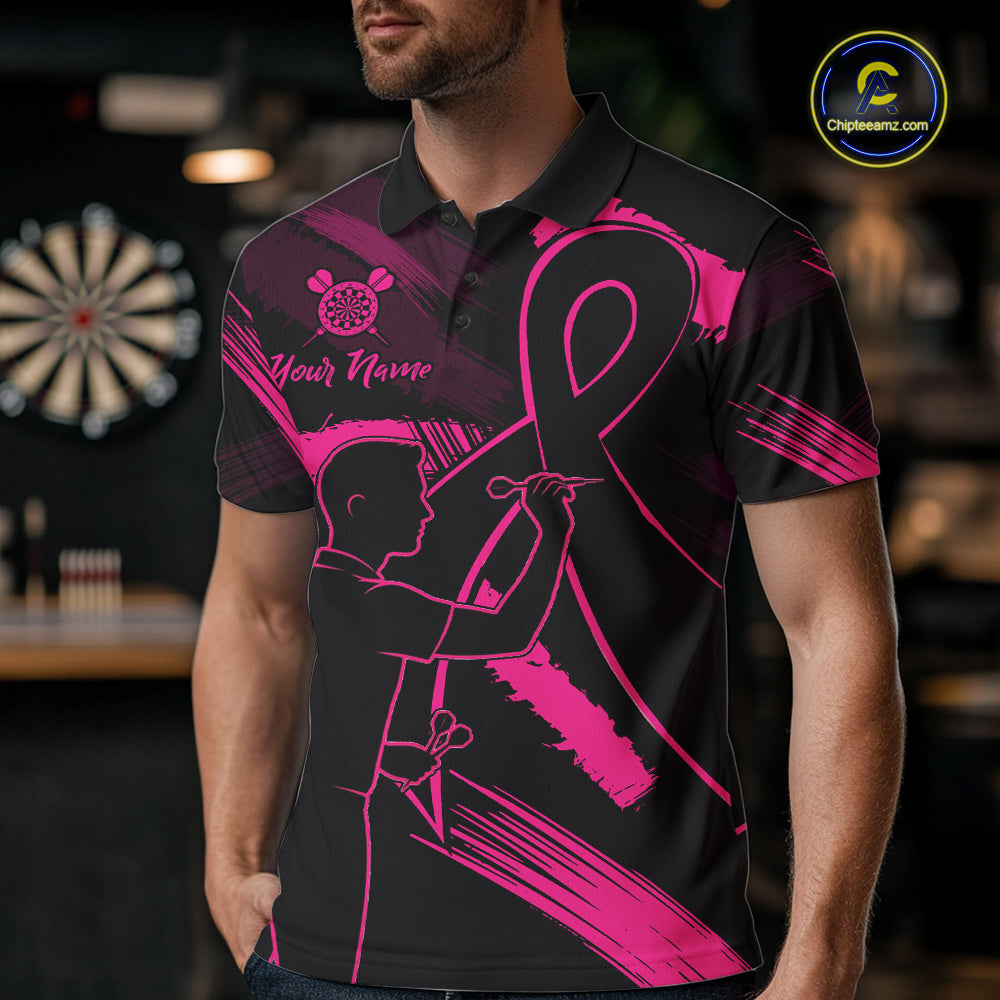 Man wearing a black and pink polo shirt with a graphic design in a bar setting