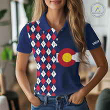 Load image into Gallery viewer, Female golfer wearing Colorado patriotic golf polo at country club, stylish golf apparel for tournaments and mountain golf trips.