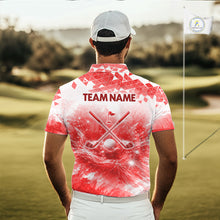 Load image into Gallery viewer, Male golfer wearing blue water splash golf polo shirt, golf ball golf apparel, men's golf outfit