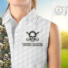 Load image into Gallery viewer, Female golfer wearing tropical skull golf polo on sunny golf course, fashionable golf apparel representing freedom, nature and resort living.