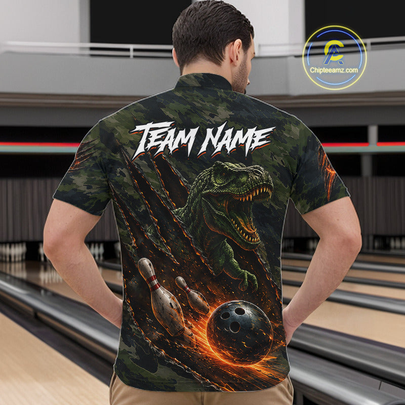 Male bowler wearing green camo dinosaur bowling polo at bowling alley, custom bowling team apparel, league-ready performance shirt